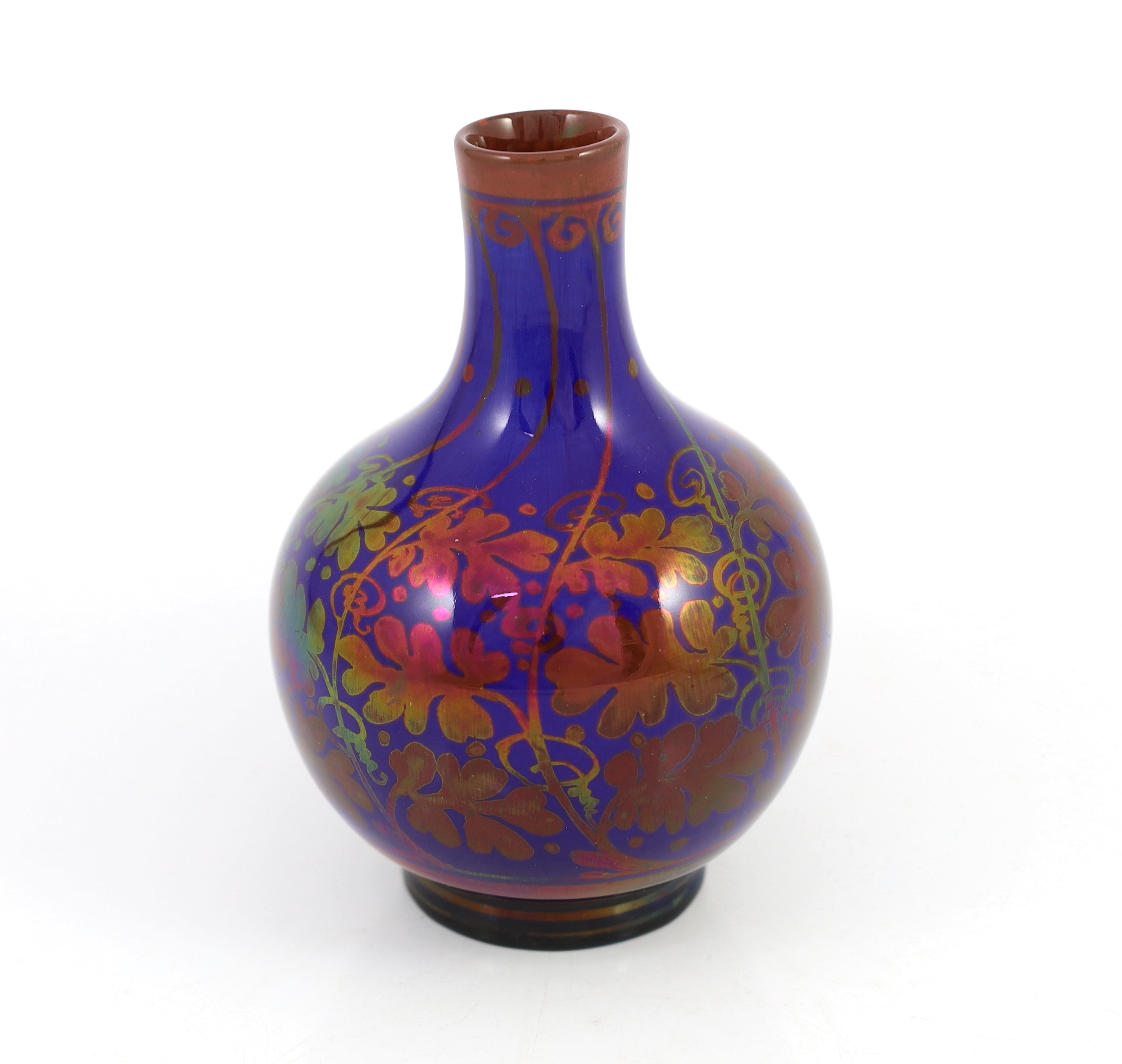 A Pilkingtons Royal Lancastrian copper lustre bottle vase, by Gordon M. Forsyth